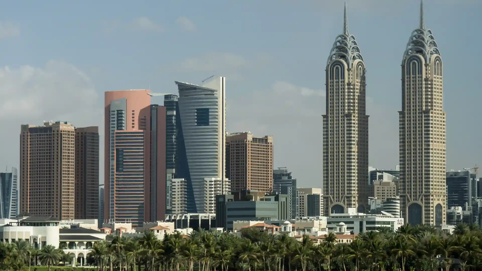 Dubai Internet City skyline with Al Salam Tower and twin Al Kazim Towers in Al Sufouh district