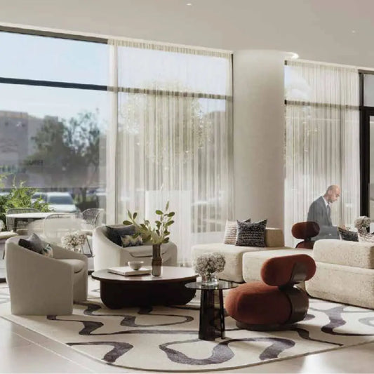 Emaar Business Park reception area with stylish furniture, natural light and large windows.