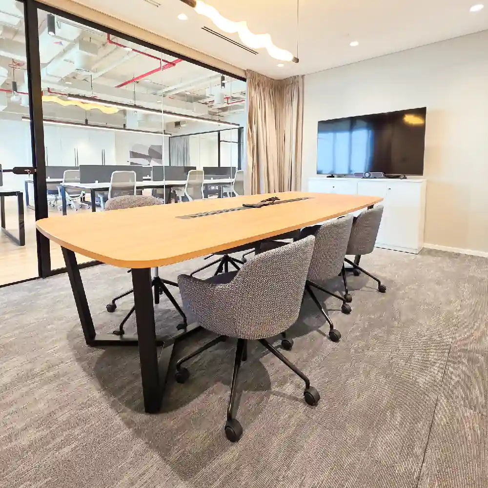 6-person enclosed meeting room with screen and privacy blinds