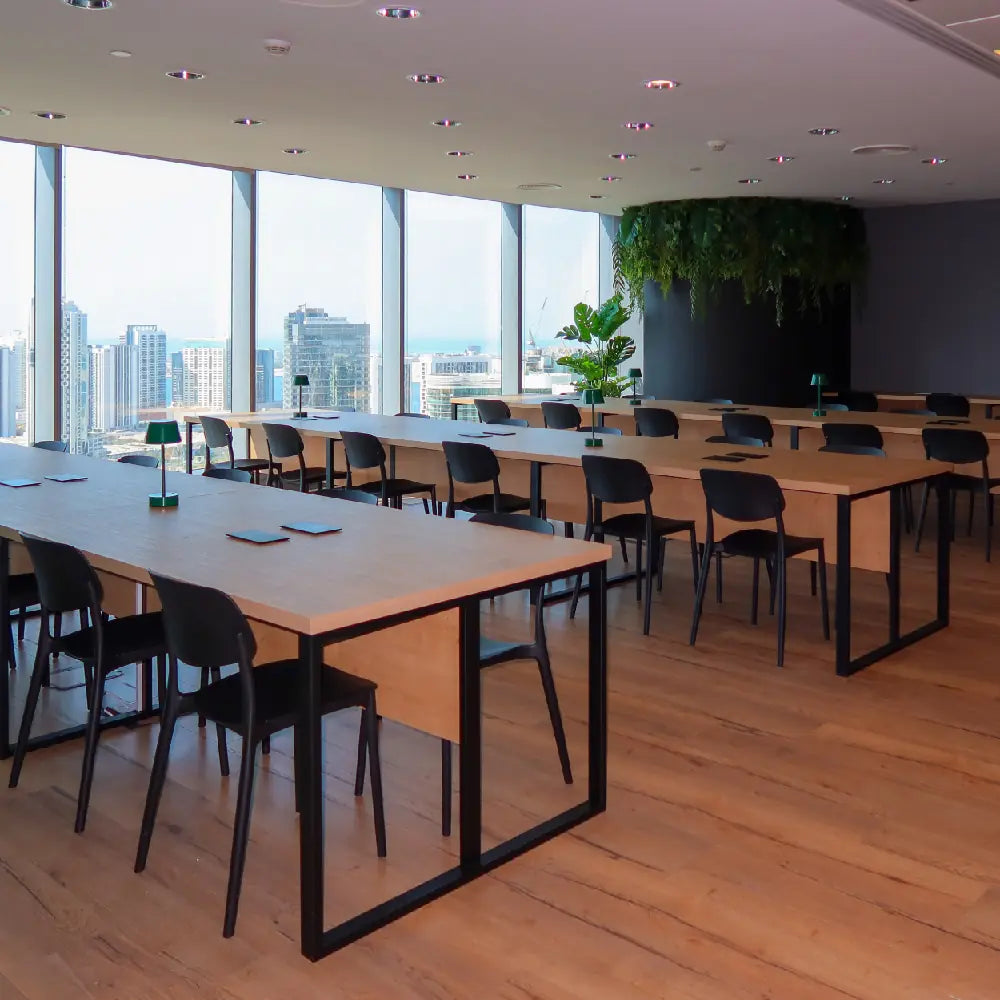 Light-filled open-plan workspace at The Work Oasis, Sky Tower, ADGM.
