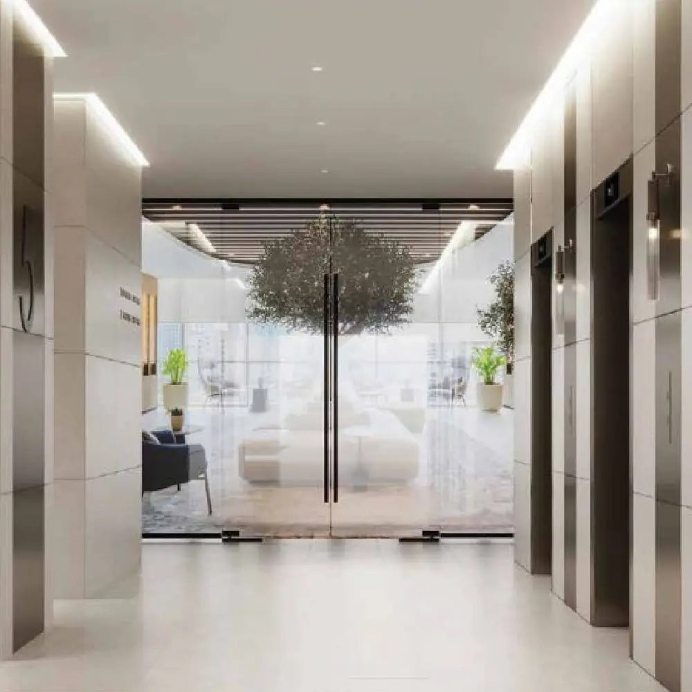 Modern interior design of elevators and hallway leading to serviced corporate office