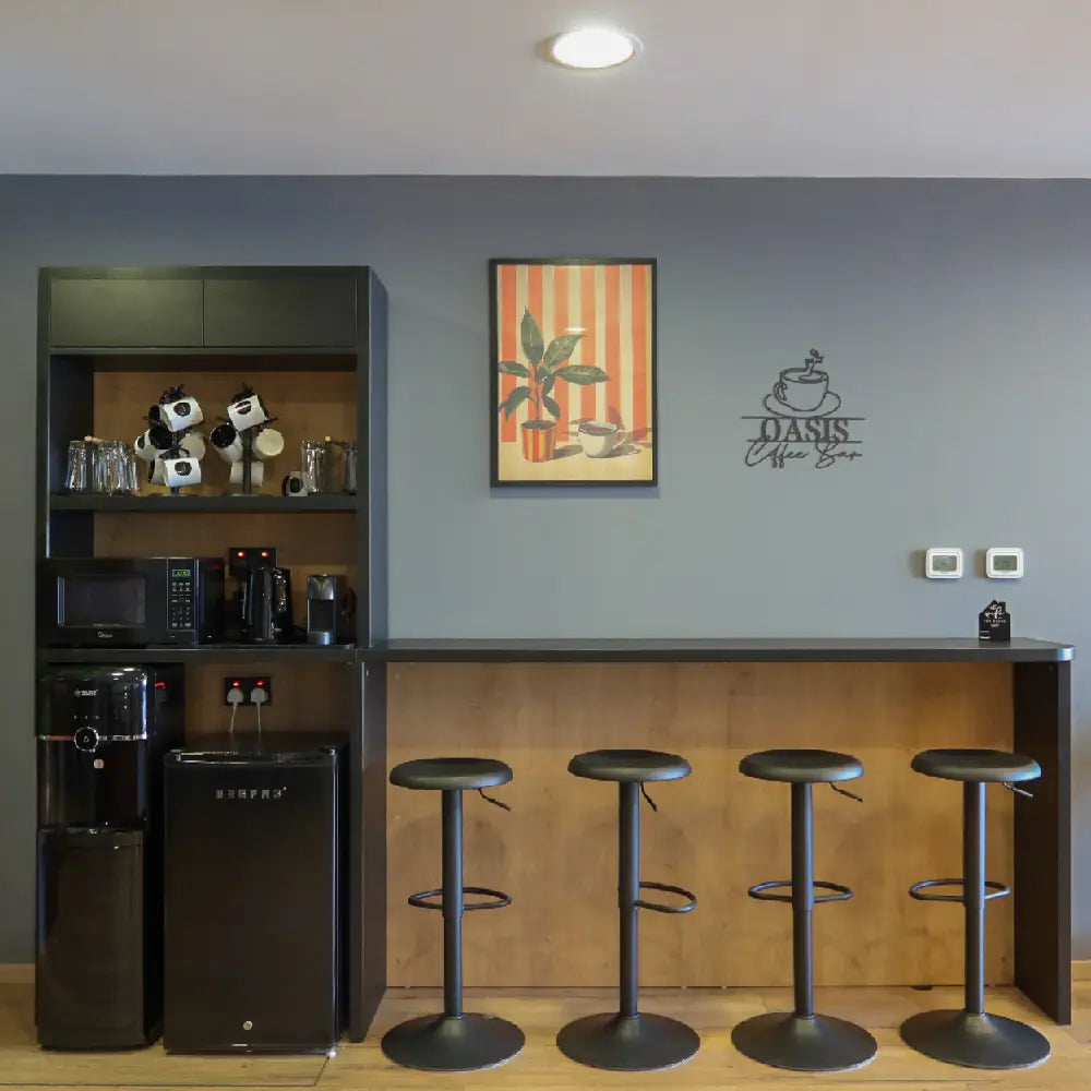 Coffee bar and breakout area at The Work Oasis, Sky Tower, ADGM.