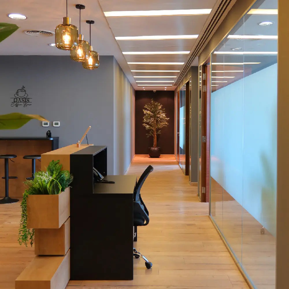 Stylish reception area with modern lighting at The Work Oasis, Abu Dhabi.