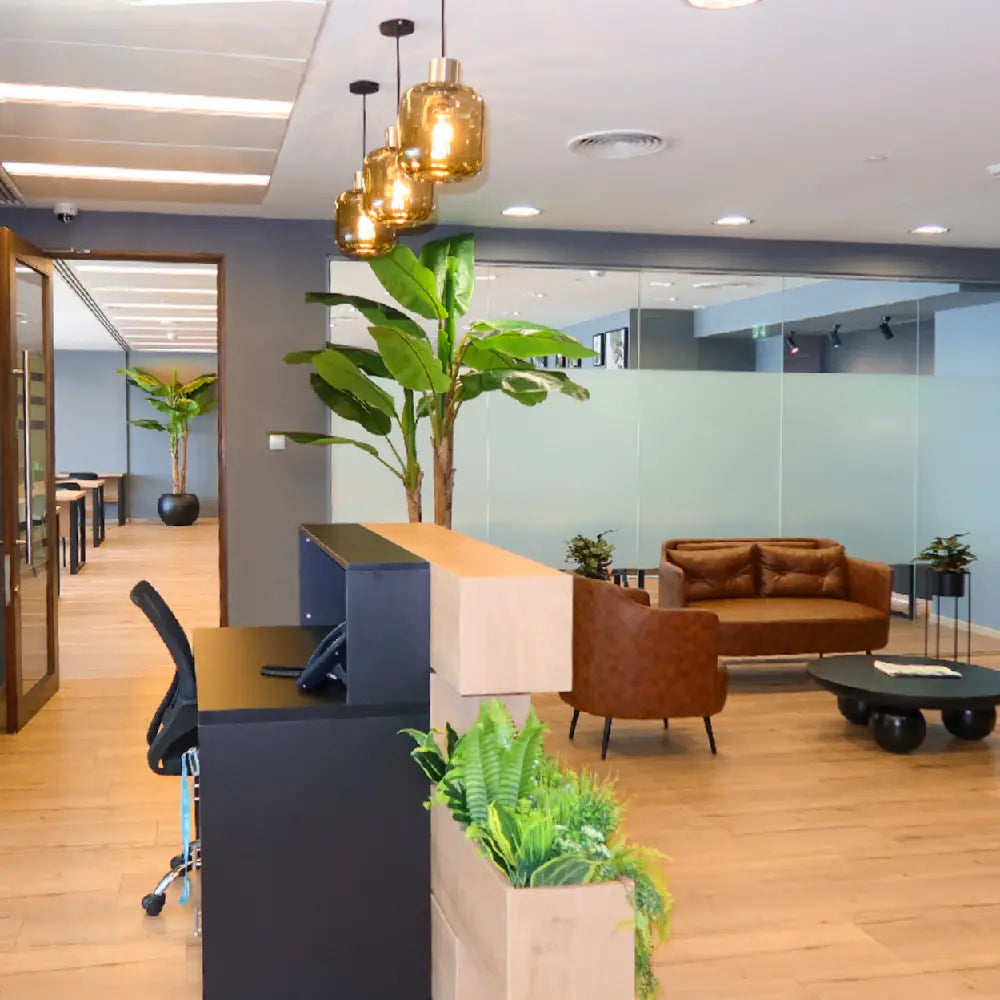 Comfortable waiting lounge at The Work Oasis, Sky Tower, ADGM.