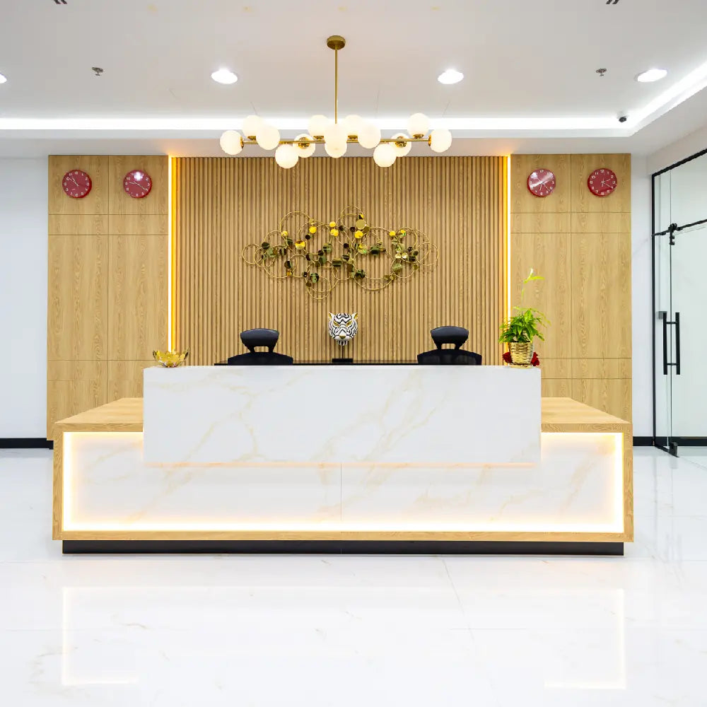 Professional reception desk with seating area at Austria Business Center, Al Hudaiba Mall