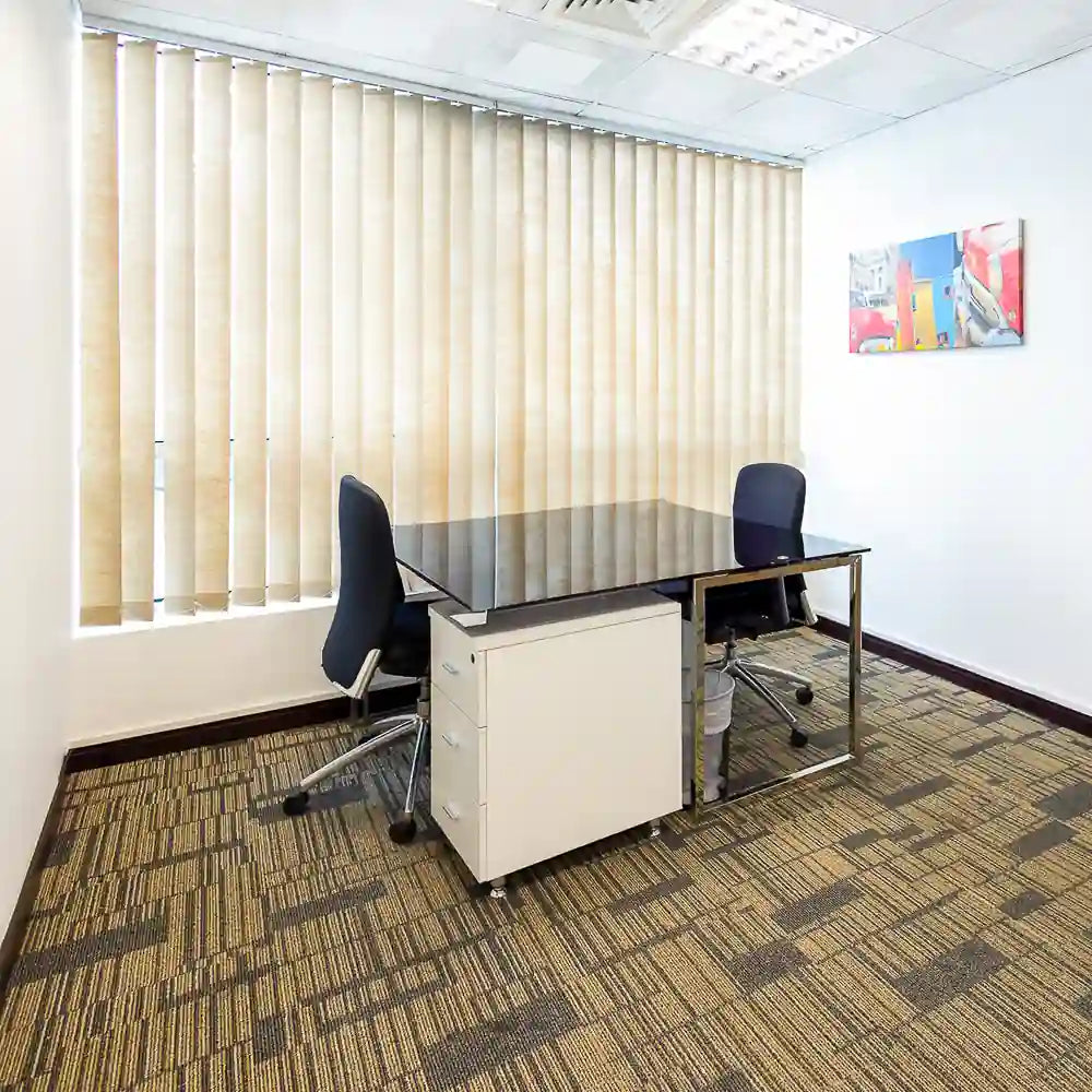 External 3-person office with modern desks at Austria Business Center, Concord Tower, Dubai Media City.