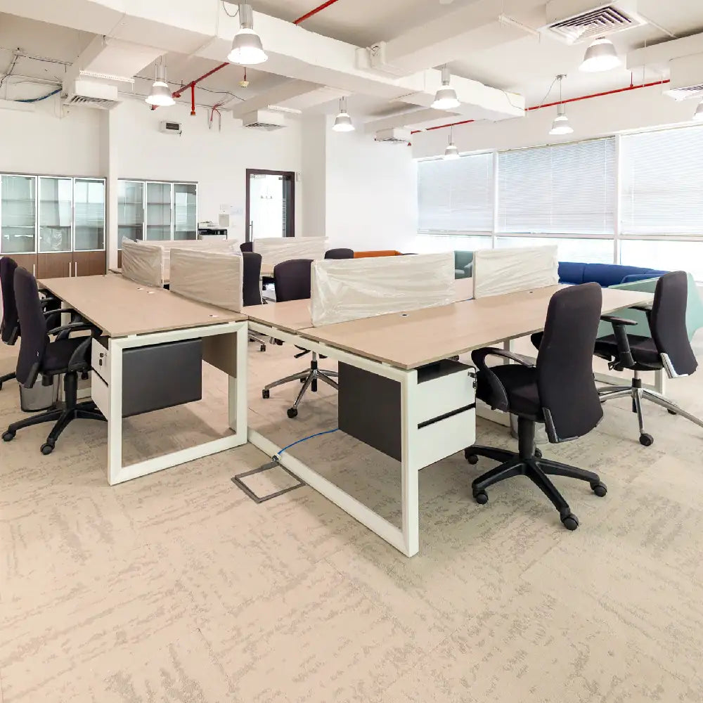 Spacious 10-person external office with desks and chairs at Austria Business Center, Concord Tower.