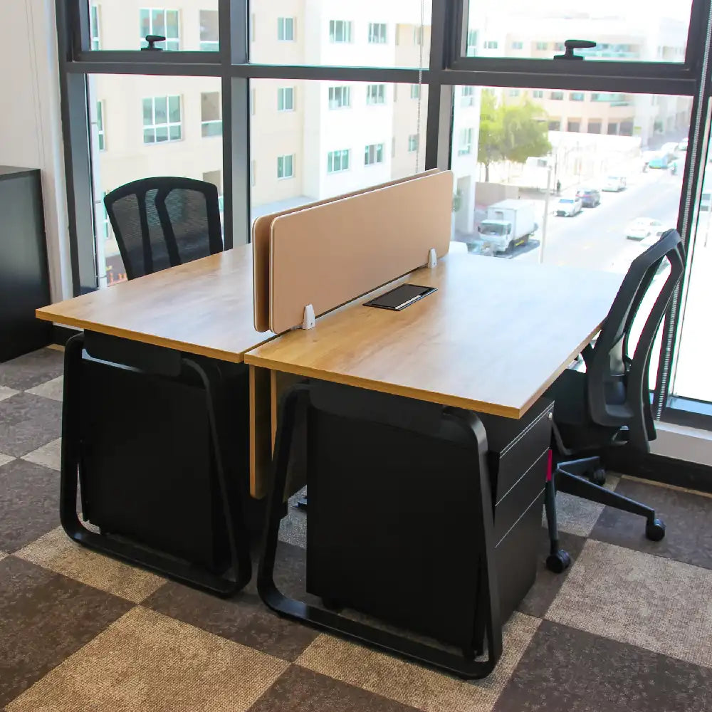 Bright external serviced office with 6 desks and natural light at Austria Business Center, Al Hudaiba Mall.