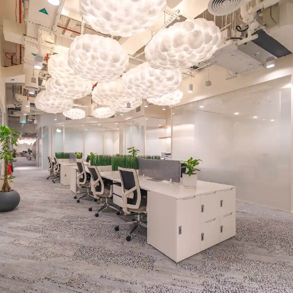 Clouds Spaces Dubai Mall fountain views co-working space with modern decor and ambient lighting