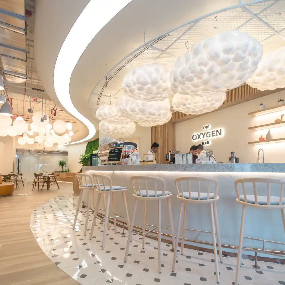 Cloud Spaces Dubai Mall Fountain Views Barista Bar with soft warm lighting and distinguished decor