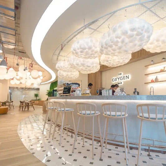 Cloud Spaces Dubai Mall Fountain Views Barista Bar with soft warm lighting and distinguished decor