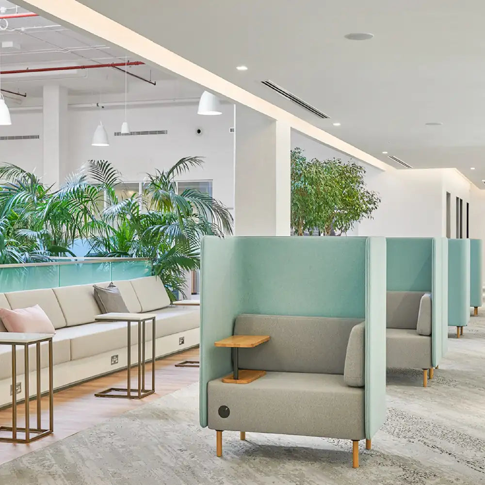 Cloud Spaces co-working modern open office space with green privacy booths and sofas