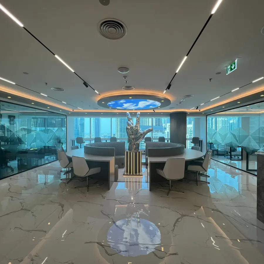 Jetset Fixed Desk in Business Bay with a modern office design, marble floor, decorative sculpture & views of the iconic Burj Khalifa