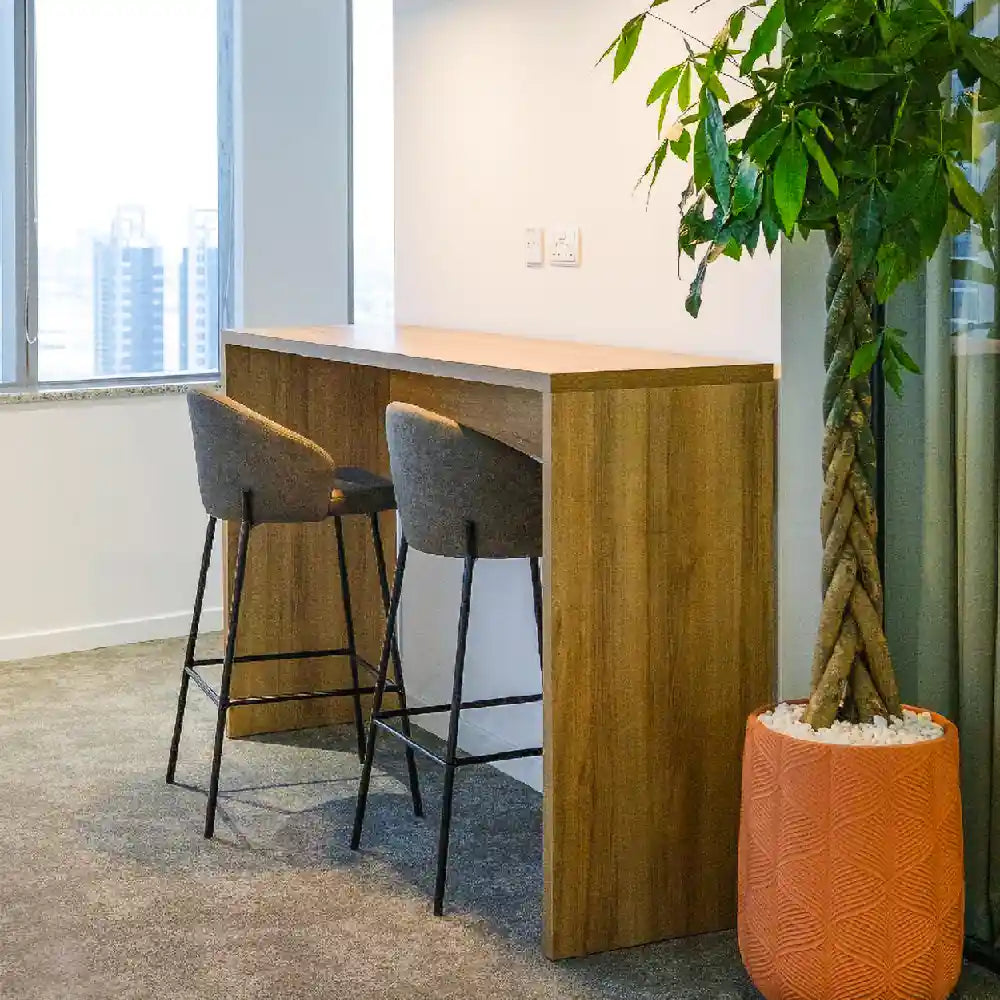 Bar-height hot desk corner with city views and natural light at Rice – Al Salam Tower