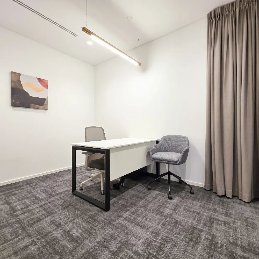 Executive private office with neutral tones and modern design
