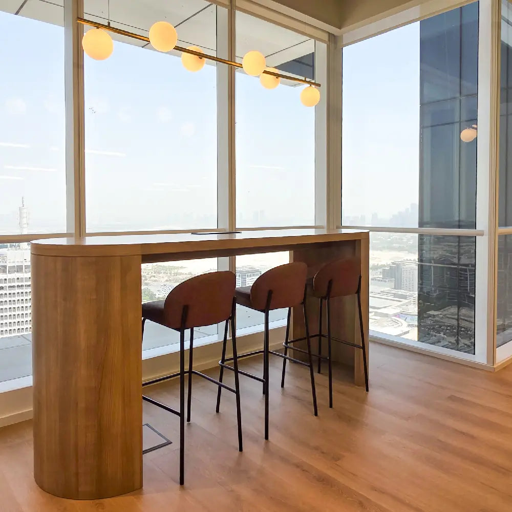 High-top breakout seating overlooking Downtown Dubai skyline