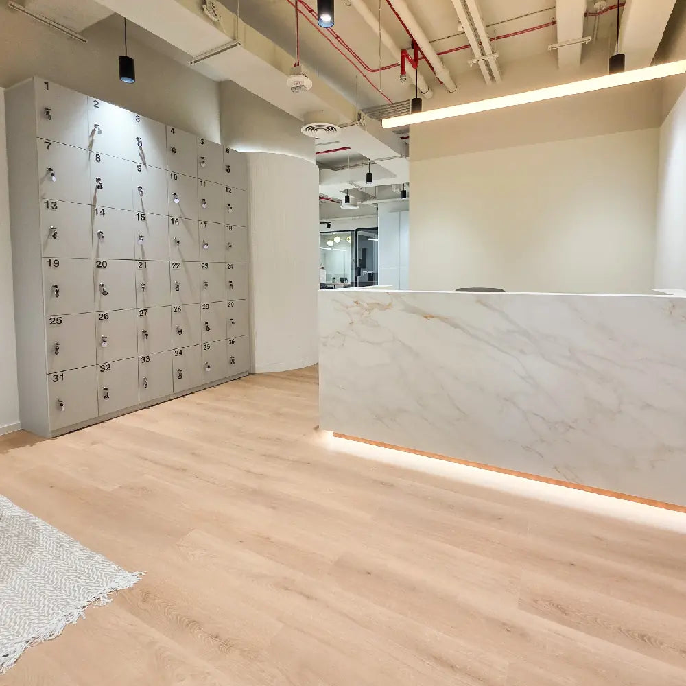 Reception area with secure locker storage and soft interior lighting