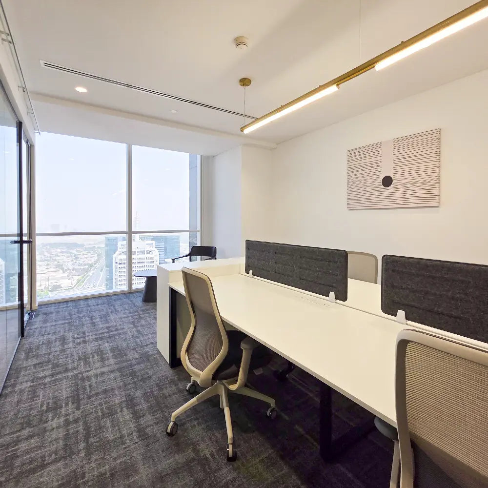 Private team office with skyline views and full-height glass partitioning