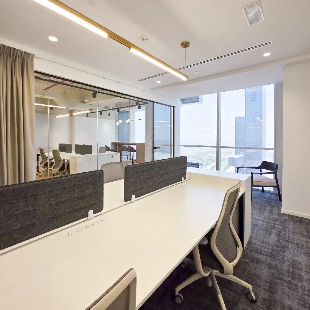 Premium corner workstation with skyline view and abundant natural light