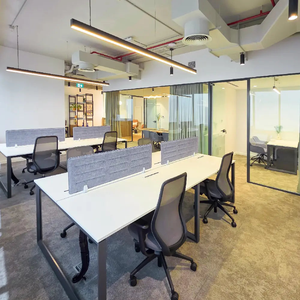Workstations with visibility into meeting room and private office area