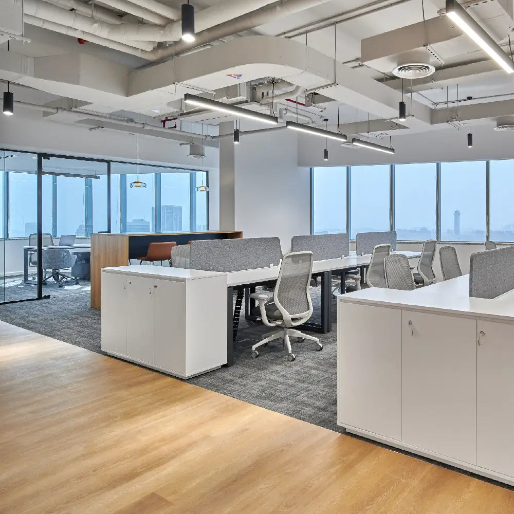 Open-plan workstation area with sea-facing windows at SPACE1, Al Salam Tower