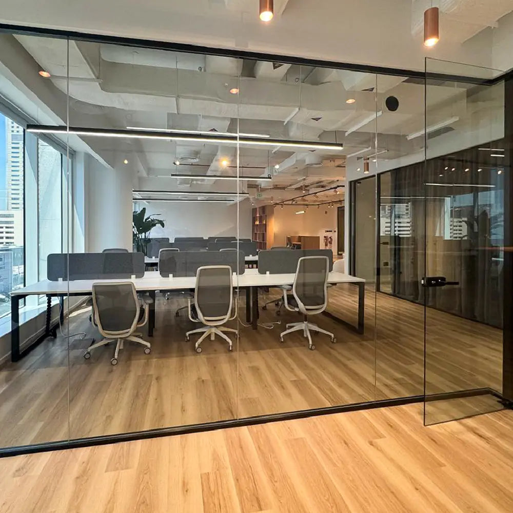 Glass partitioned corporate office layout at Space1